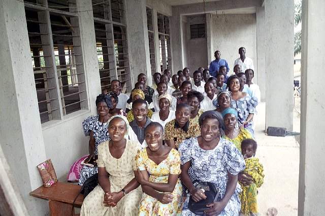 Sunday school class held on the porch of the unfinished new Bomso Church - October 2000
