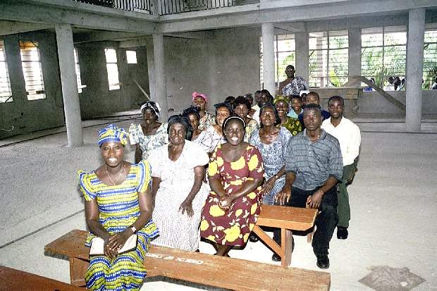 Sunday school classes held inside the unfinished new church at Bonsi - October 2000